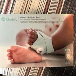 Owlet Dream Sock comes with everything in the box. NEVER USED!
